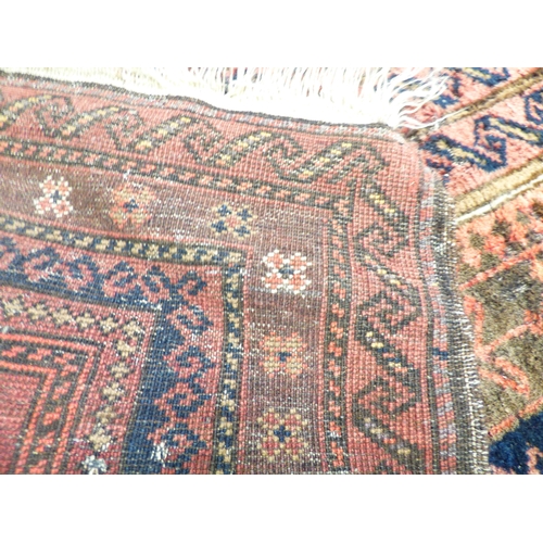 1 - Three rugs: to include a Persian style example, decorated with a central medallion and floral border... 