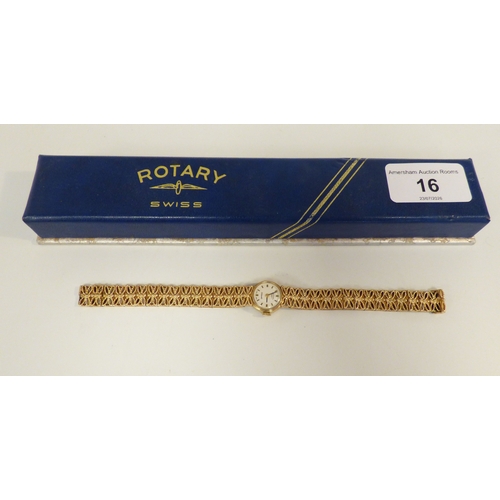 16 - A lady's Rotary 9ct gold cased, manual bracelet wristwatch, faced by a baton dial  (approx. 23.1grms... 