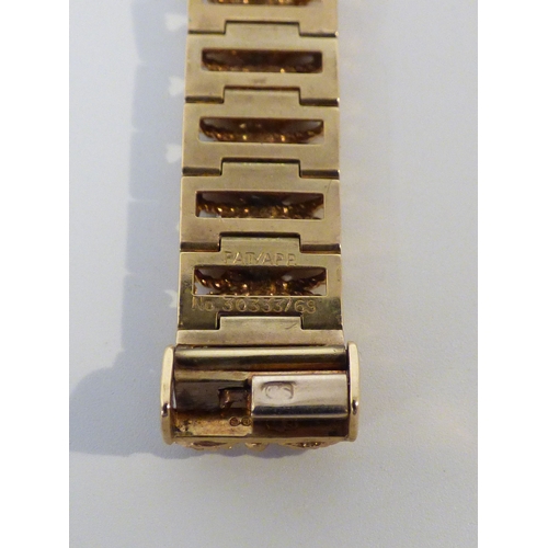 16 - A lady's Rotary 9ct gold cased, manual bracelet wristwatch, faced by a baton dial  (approx. 23.1grms... 