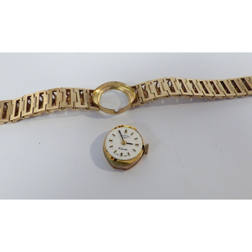 16 - A lady's Rotary 9ct gold cased, manual bracelet wristwatch, faced by a baton dial  (approx. 23.1grms... 