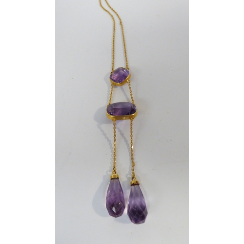18 - A 9ct gold pendant necklace, set with variously cut amethyst
