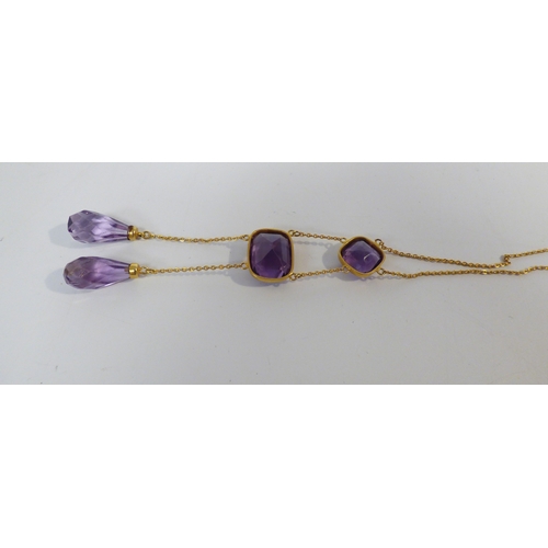 18 - A 9ct gold pendant necklace, set with variously cut amethyst