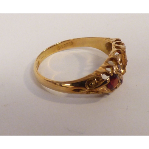 20 - An 18ct gold, ruby and diamond ring (centre stone missing)&nbsp; (approx. 3.6grms)