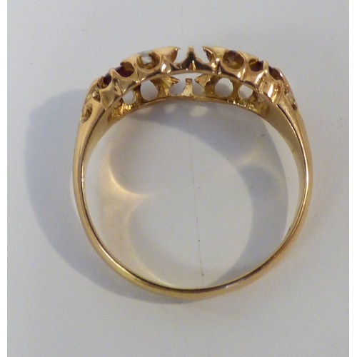 20 - An 18ct gold, ruby and diamond ring (centre stone missing)&nbsp; (approx. 3.6grms)