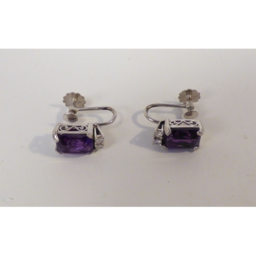30 - A pair of 18ct white gold, amethyst set earrings&nbsp; (approx. combined gross weight 5.4grms)