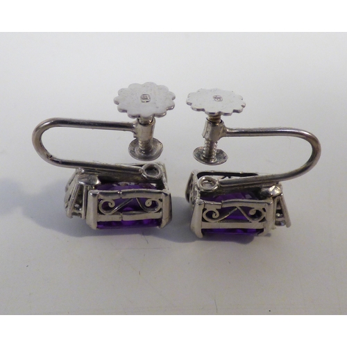 30 - A pair of 18ct white gold, amethyst set earrings&nbsp; (approx. combined gross weight 5.4grms)