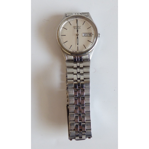 37 - A Tissot Touch Titanium cased  wristwatch, on a black rubber strap; and a Seiko stainless steel case... 