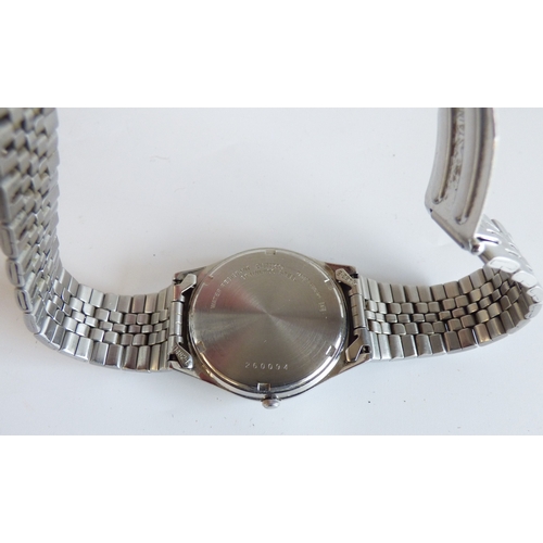 37 - A Tissot Touch Titanium cased  wristwatch, on a black rubber strap; and a Seiko stainless steel case... 