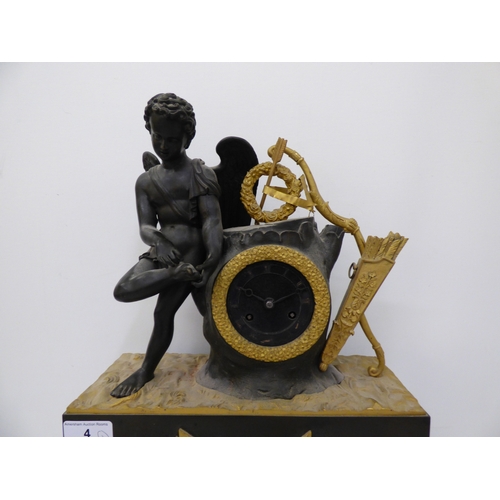 4 - An early 20thC (probably) French bronze and gilt metal cased mantel clock, surmounted by an angelic ... 