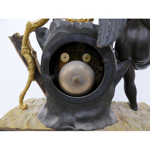 4 - An early 20thC (probably) French bronze and gilt metal cased mantel clock, surmounted by an angelic ... 