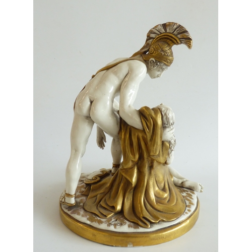 41 - Decorative ceramics: to include a Naples porcelain group, a Roman soldier, assisting a lady  9