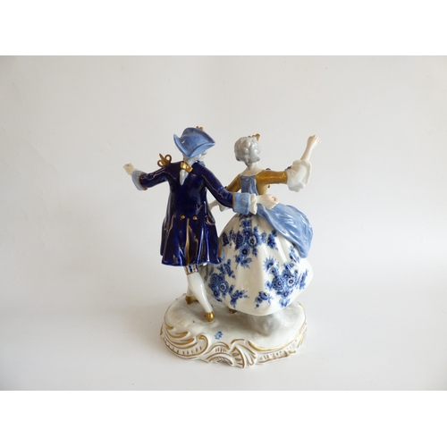 41 - Decorative ceramics: to include a Naples porcelain group, a Roman soldier, assisting a lady  9