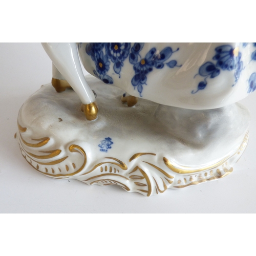 41 - Decorative ceramics: to include a Naples porcelain group, a Roman soldier, assisting a lady  9