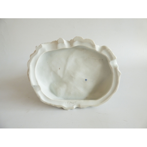 41 - Decorative ceramics: to include a Naples porcelain group, a Roman soldier, assisting a lady  9