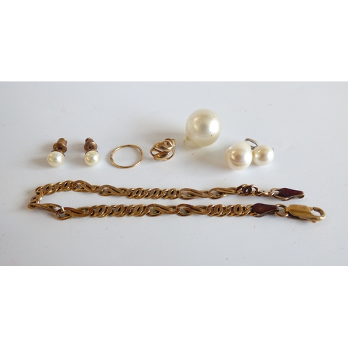 46 - Items of personal ornament: to include a lady's gold plated, stainless steel cased and strapped wris... 