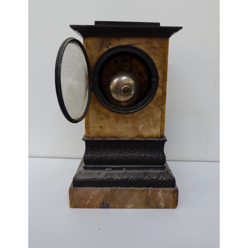 5 - Three variously cased and aged mantel clocks: to include an early 20thC black slate and marble examp... 