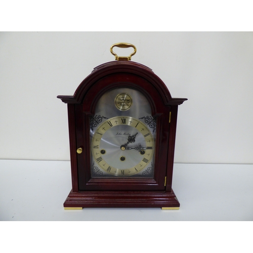 5 - Three variously cased and aged mantel clocks: to include an early 20thC black slate and marble examp... 