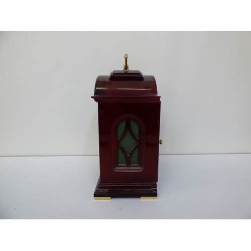 5 - Three variously cased and aged mantel clocks: to include an early 20thC black slate and marble examp... 