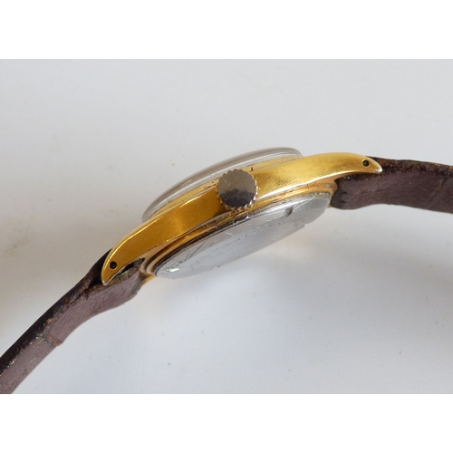 52 - A Hermes gold plated, stainless steel cased wristwatch, the 17 jewel shock resistant movement faced ... 