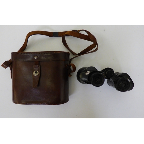 9 - Binoculars, variously cased and optical strengths