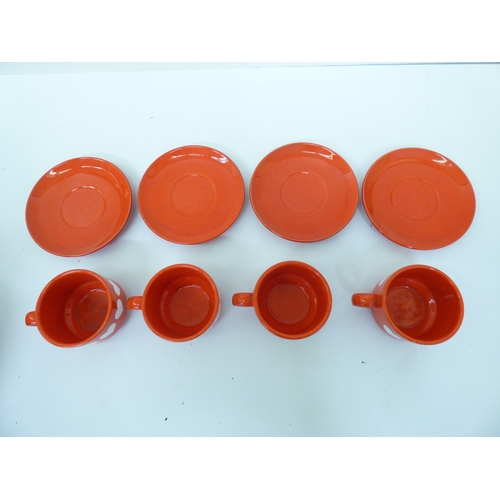43 - Waechtersbach, W. Germany pottery tableware, decorated with white hearts, on a red ground
