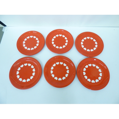 43 - Waechtersbach, W. Germany pottery tableware, decorated with white hearts, on a red ground