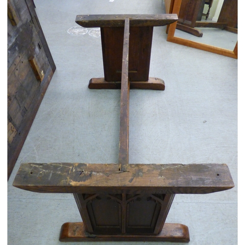 A mid 18thC and later oak refectory table, the one piece top over twin ...