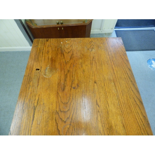 A late 19th/early 20thC oak twin pedestal seven drawer desk, on a ...