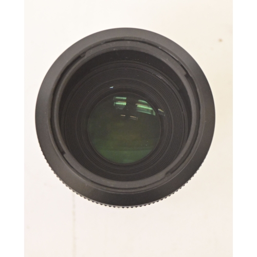 Photographic equipment, viz. a Sony Alpha A65 DSLR camera with a Sigma ...