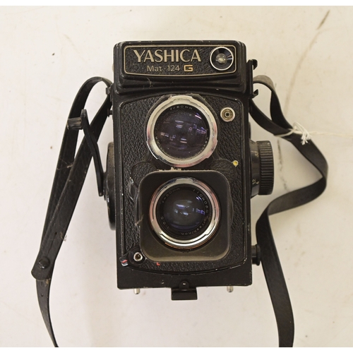 Photographic equipment: a Yashica Mat-124 G twin lens reflex camera