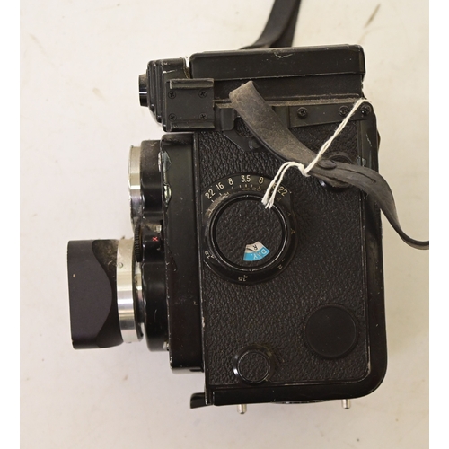 Photographic equipment: a Yashica Mat-124 G twin lens reflex camera
