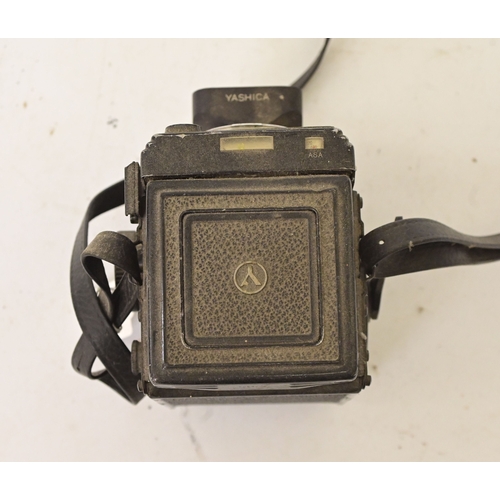 Photographic equipment: a Yashica Mat-124 G twin lens reflex camera