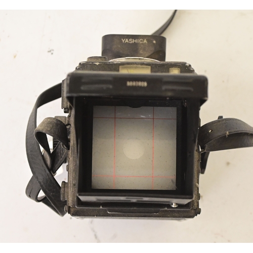Photographic equipment: a Yashica Mat-124 G twin lens reflex camera