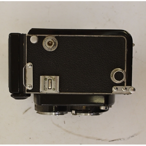 Photographic equipment: a Minolta Autocord twin lens reflex camera