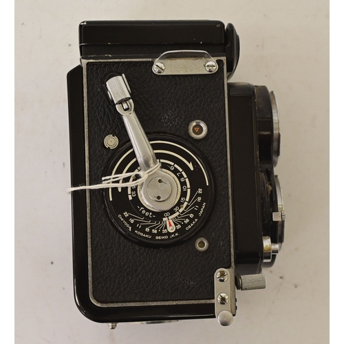 Photographic equipment: a Minolta Autocord twin lens reflex camera