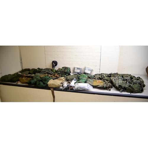 Military uniforms: to include a field axe/shovel(Please Note: this lot ...