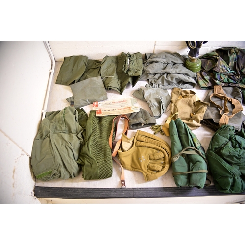 Military uniforms: to include a field axe/shovel(Please Note: this lot ...