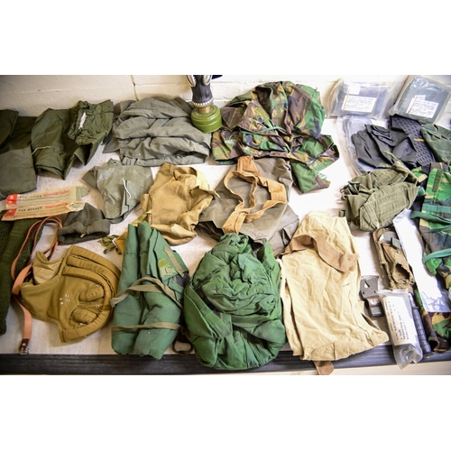Military uniforms: to include a field axe/shovel(Please Note: this lot ...