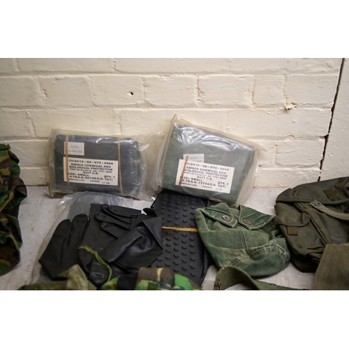 Military uniforms: to include a field axe/shovel(Please Note: this lot ...