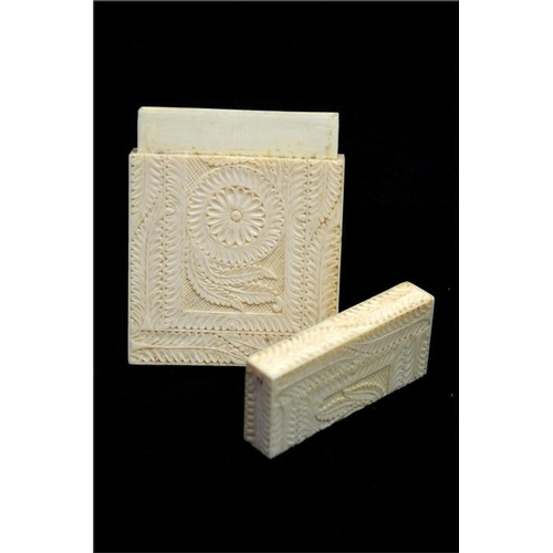 101 - λ A Chinese carved ivory card case, 19th century, engraved with geometric foliate design of rosette ... 