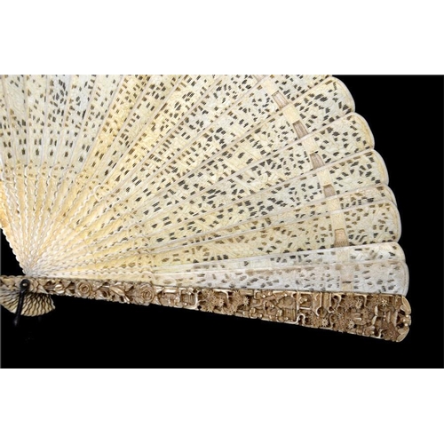 131 - A late 18th - early 19th century Chinese Canton export ivory brise fan with guardsticks carved in re... 