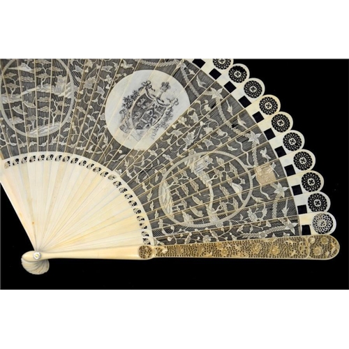 132 - λ An unusual Chinese Canton export carved ivory grand brisé mourning fan, late 18th/early 19th centu... 