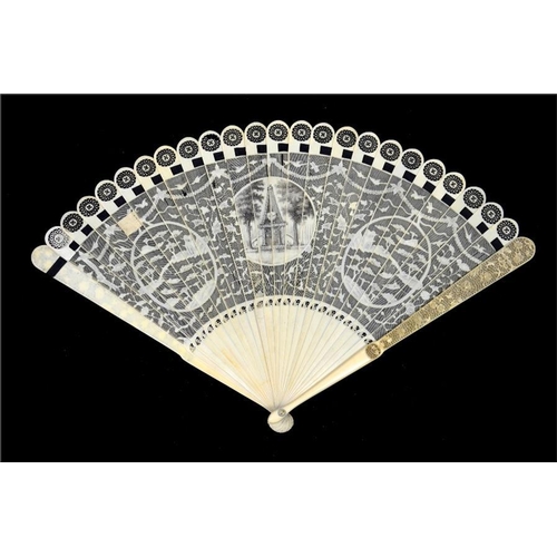 132 - λ An unusual Chinese Canton export carved ivory grand brisé mourning fan, late 18th/early 19th centu... 