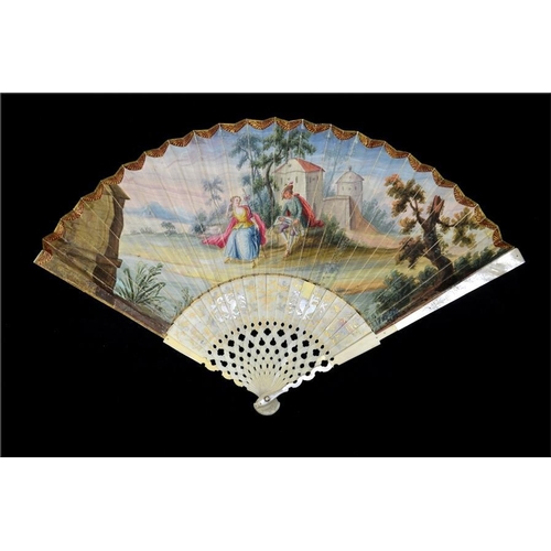 133 - λ A mid 18th century ivory fan, with ivory sticks and guards, the guards covered in engraved mother ... 