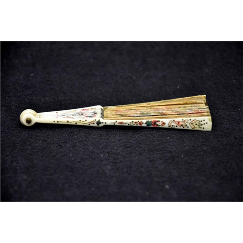 138 - λ A very rare 18th century miniature ivory fan, the guards with the finest possible piqué work and p... 