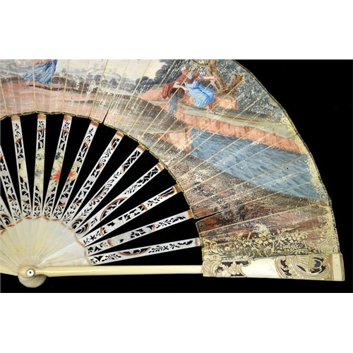 141 - λ A late 18th century fan, the ivory guards and sticks carved and pierced with baskets of flowers, t... 