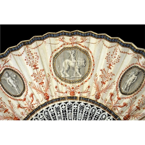 142 - λ An early 19th century grand tour type fan, probably Italian, with finely carved and pierced ivory ... 