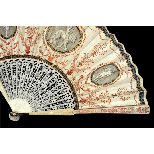 142 - λ An early 19th century grand tour type fan, probably Italian, with finely carved and pierced ivory ... 