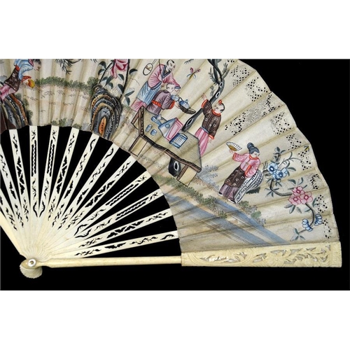 147 - An 18th century decoupé Chinoiserie fan, with carved and pierced guards and sticks, the upper guards... 