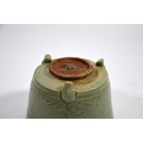 15 - A Chinese celadon censer, incised foliate design, on three feet, 10cm high